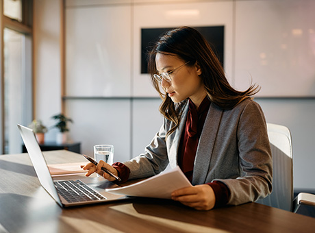 A Financial Consultant reviews a member's investment performance and makes necessary adjustments.