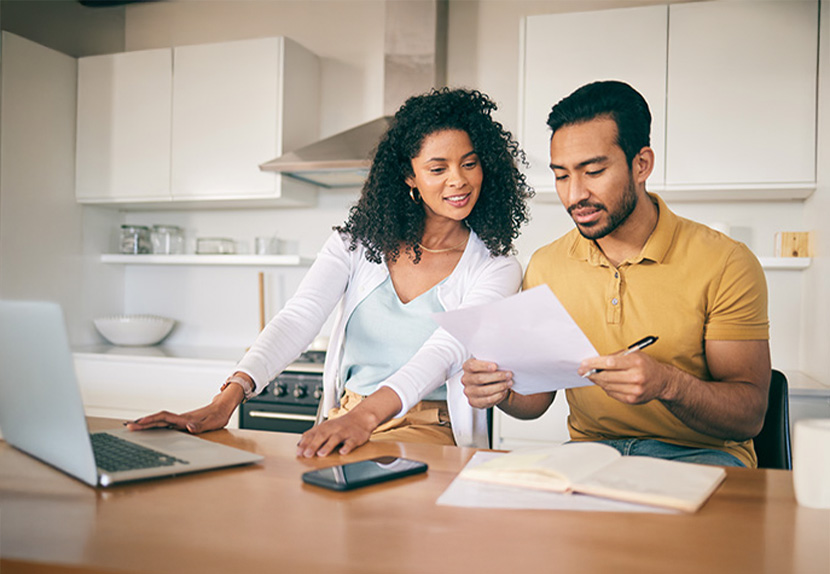 couple reviewing together in home