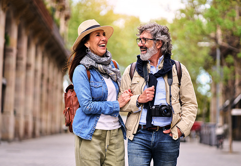 A couple revels in their high-rate certificate's rewards, enhancing their getaway vacation experience