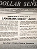 A close-up of a newspaper headline from 1985 that reads "Rex #2 Changes Name to Landmark Credit Union." The headline is in large, bold letters, and the text below the headline says, "New name reflects